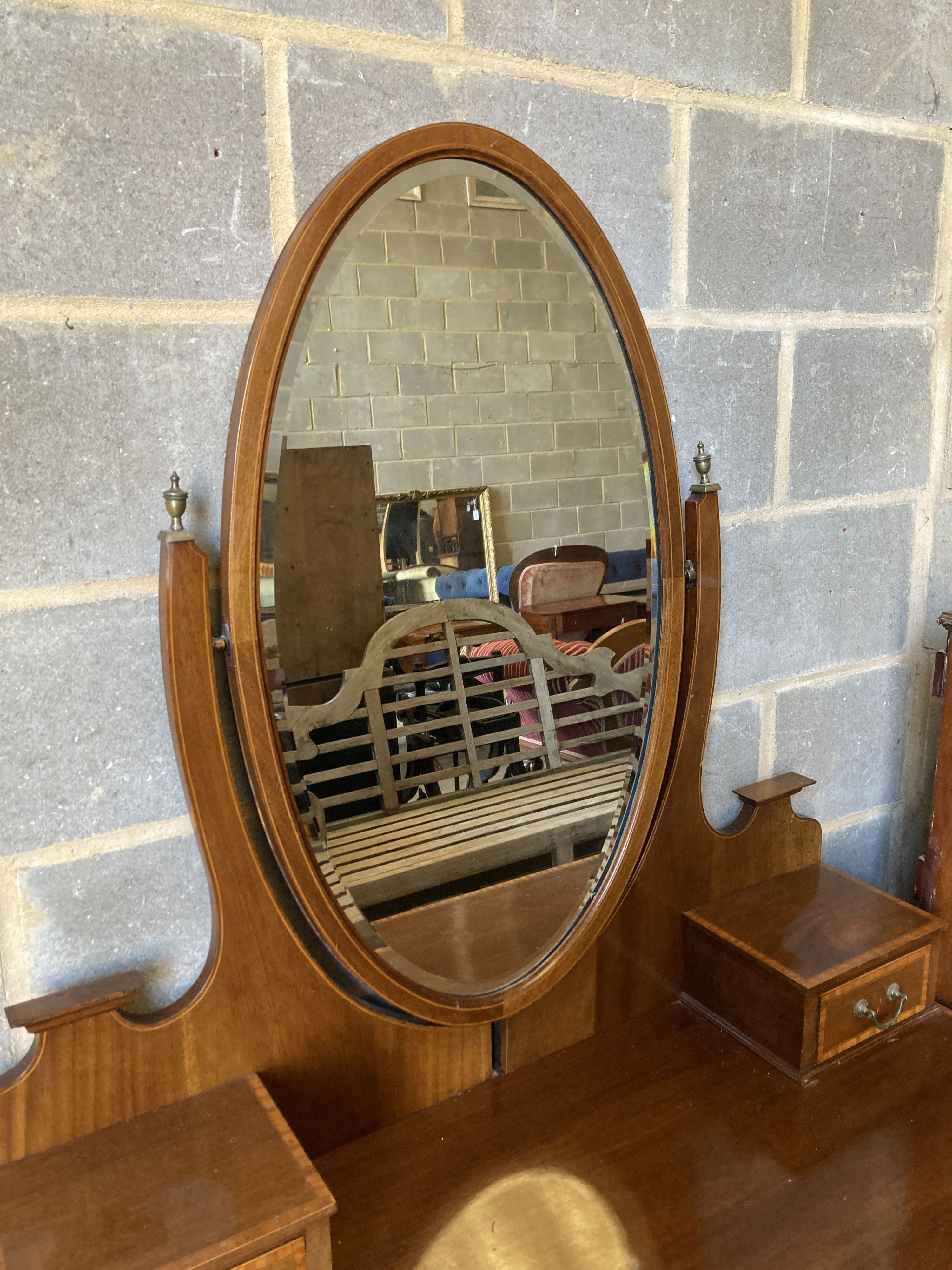 An Edwardian satinwood banded mahogany dressing table, width 107cm, depth 52cm, height 190cm